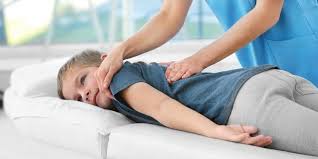 a child receiving chiropractic adjustment